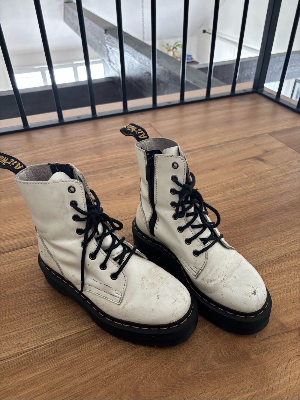 Dr. Martens White Lace-Up Platform Boots with Black Sole